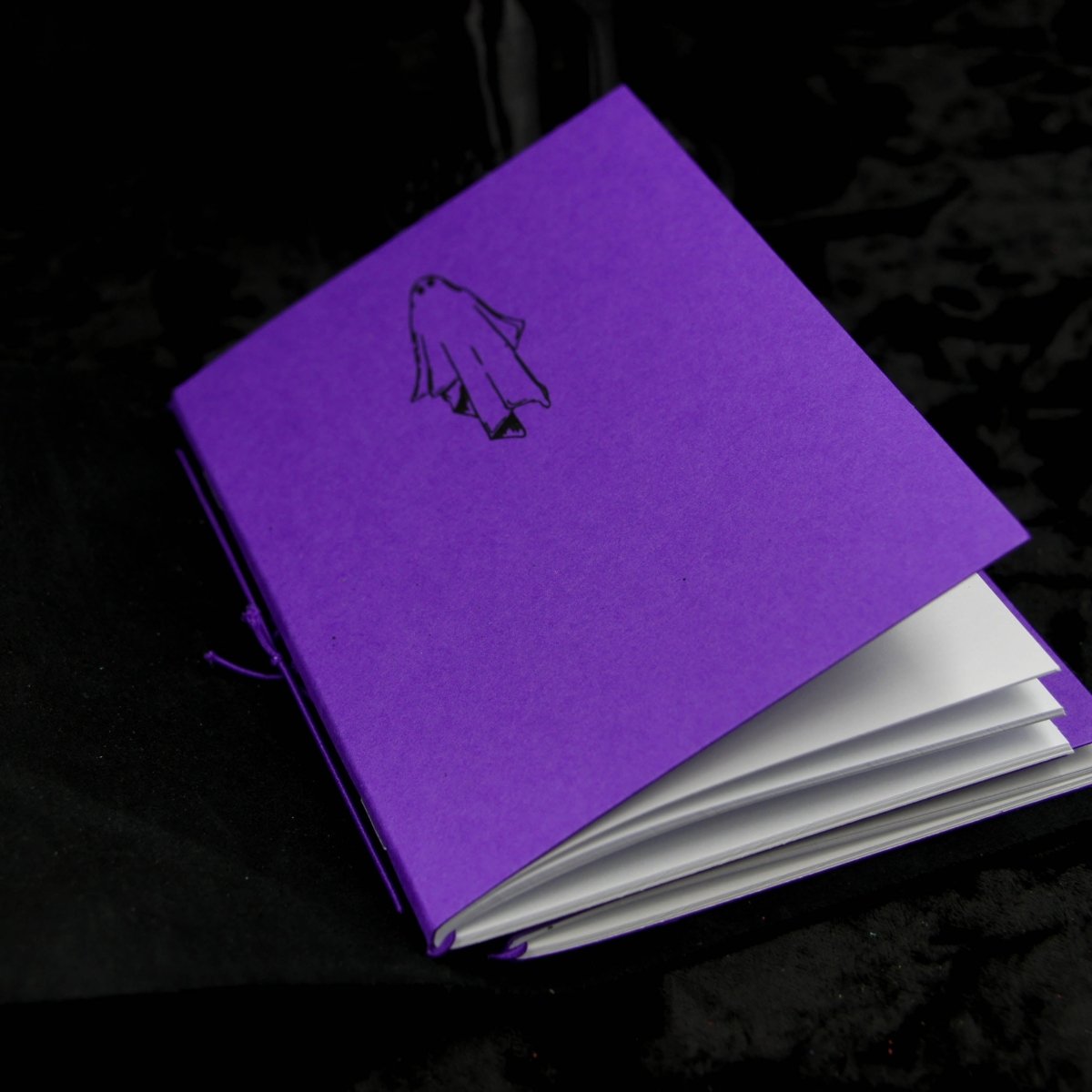 Close up of our travellers notebook refill in our leather journal