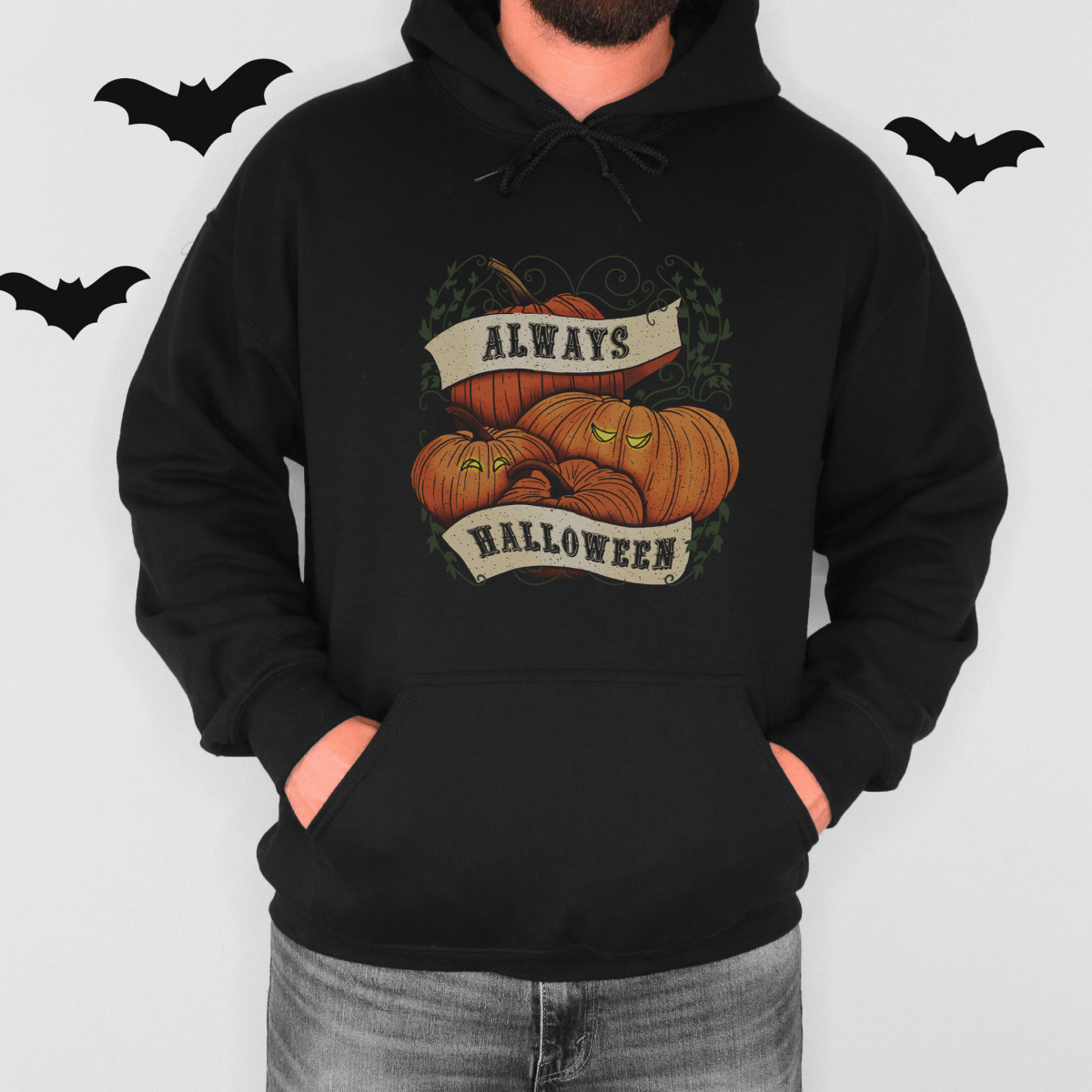 Gentleman with hands in his pockets wearing our adult Halloween hoodie - The Gothic Stationery Company -
