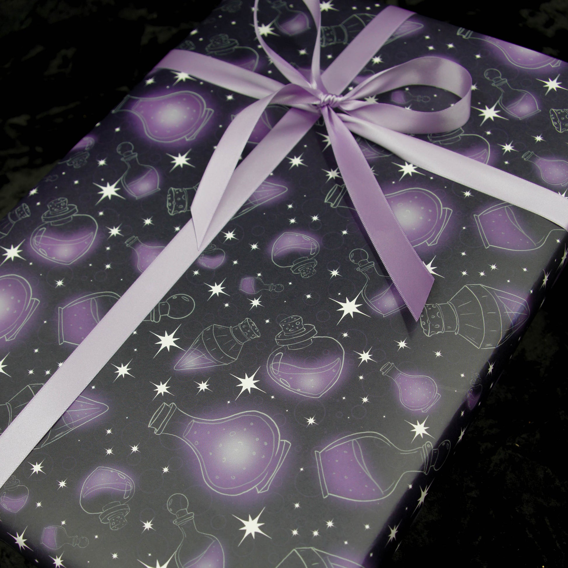 Goth Black Wrapping Paper with Purple Snowflakes