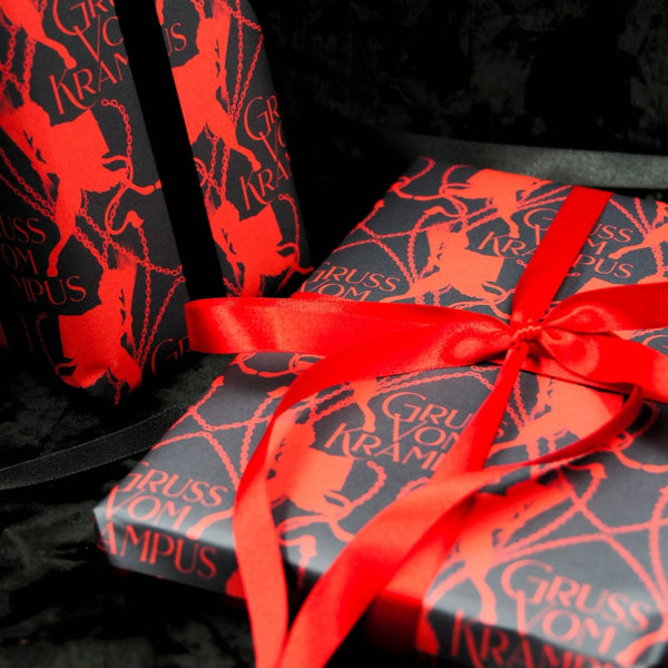 Papier d’emballage Krampus noir et rouge| Emballage cadeau de Noël gothique